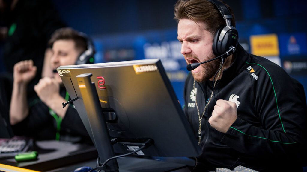 Excited esports player celebrating during a Counter Strike match