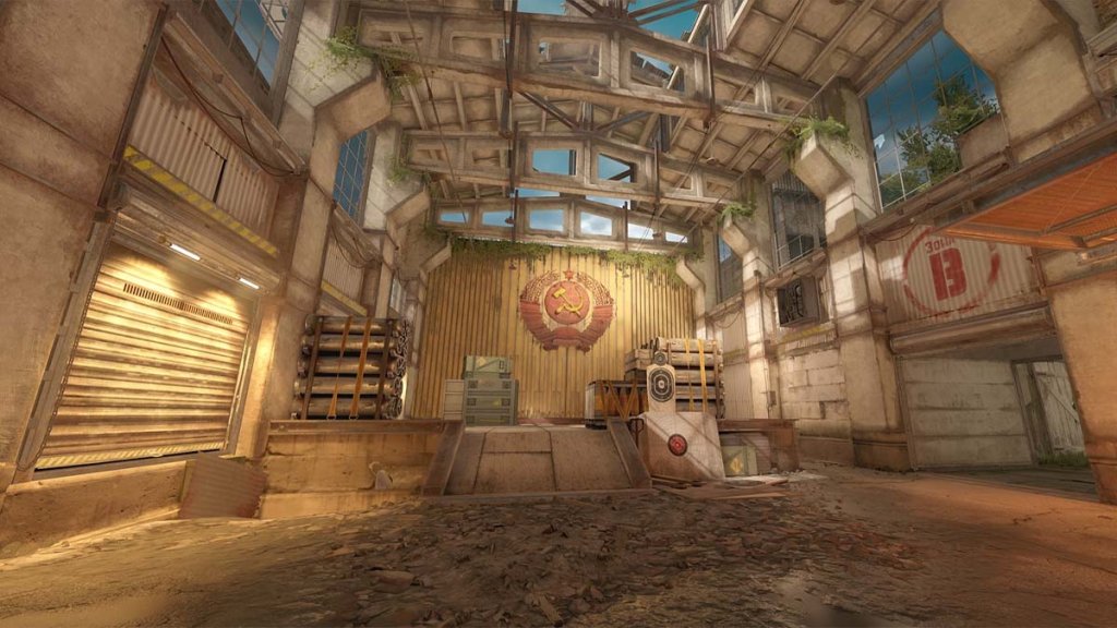 Counter-Strike: Global Offensive map de_cache bombsite B with Soviet emblem and crates