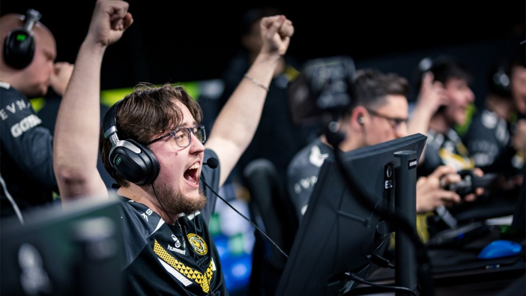 Excited esports player celebrating a victory during a Counter-Strike match