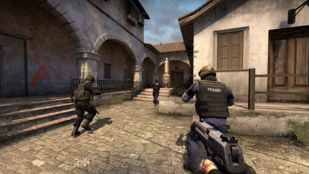 Counter-Strike players in a tactical scene on a cobblestone map.