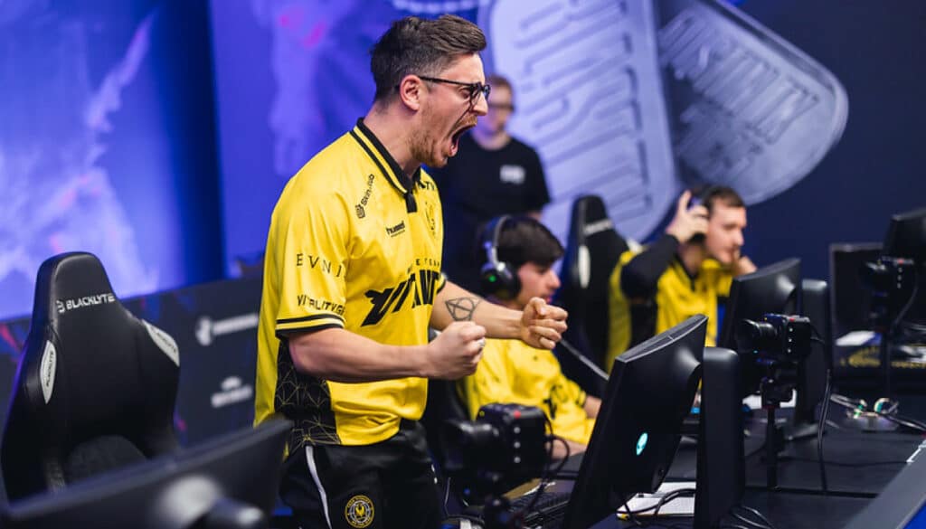 Excited esports team celebrating during a Counter Strike tournament