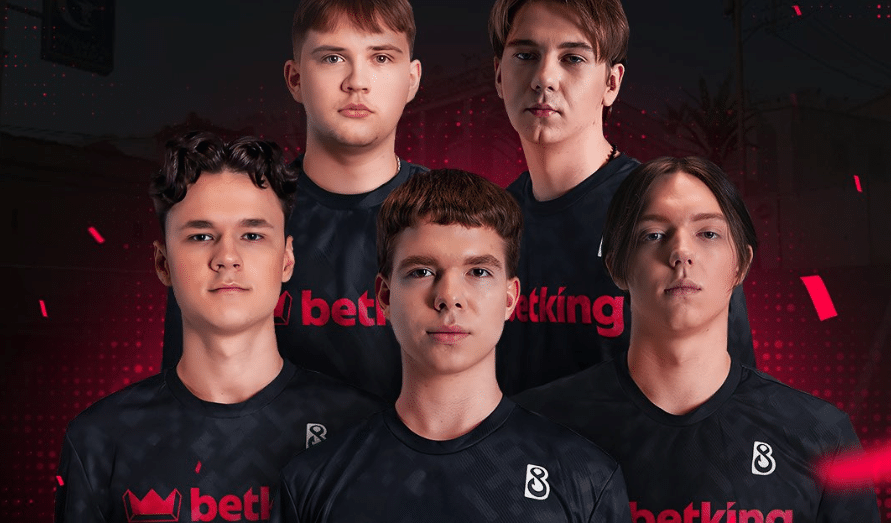Esports team of five players in black jerseys with Betking logo, posing against a dramatic background