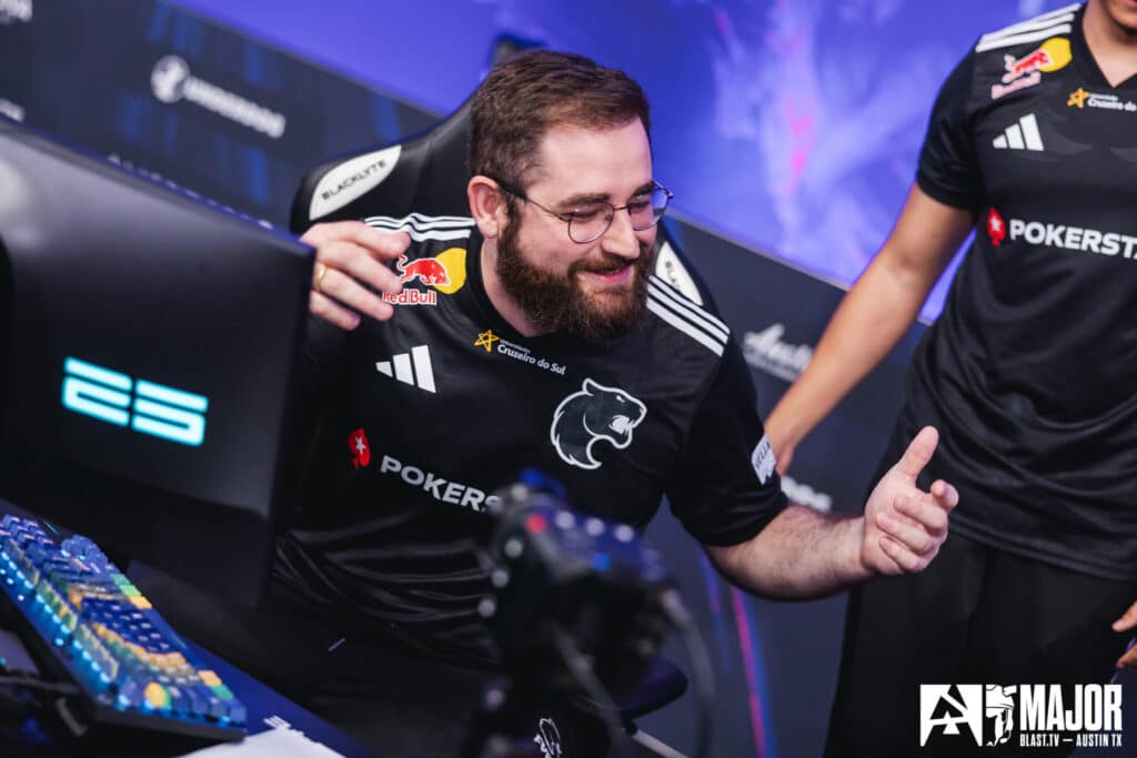 Esports player celebrating during a Counter-Strike tournament at Blast.tv Major event.