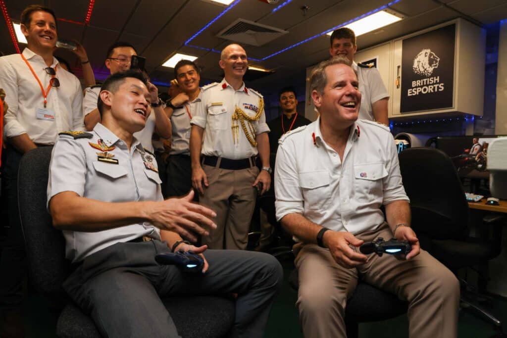 Group of people enjoying gaming session at British Esports event